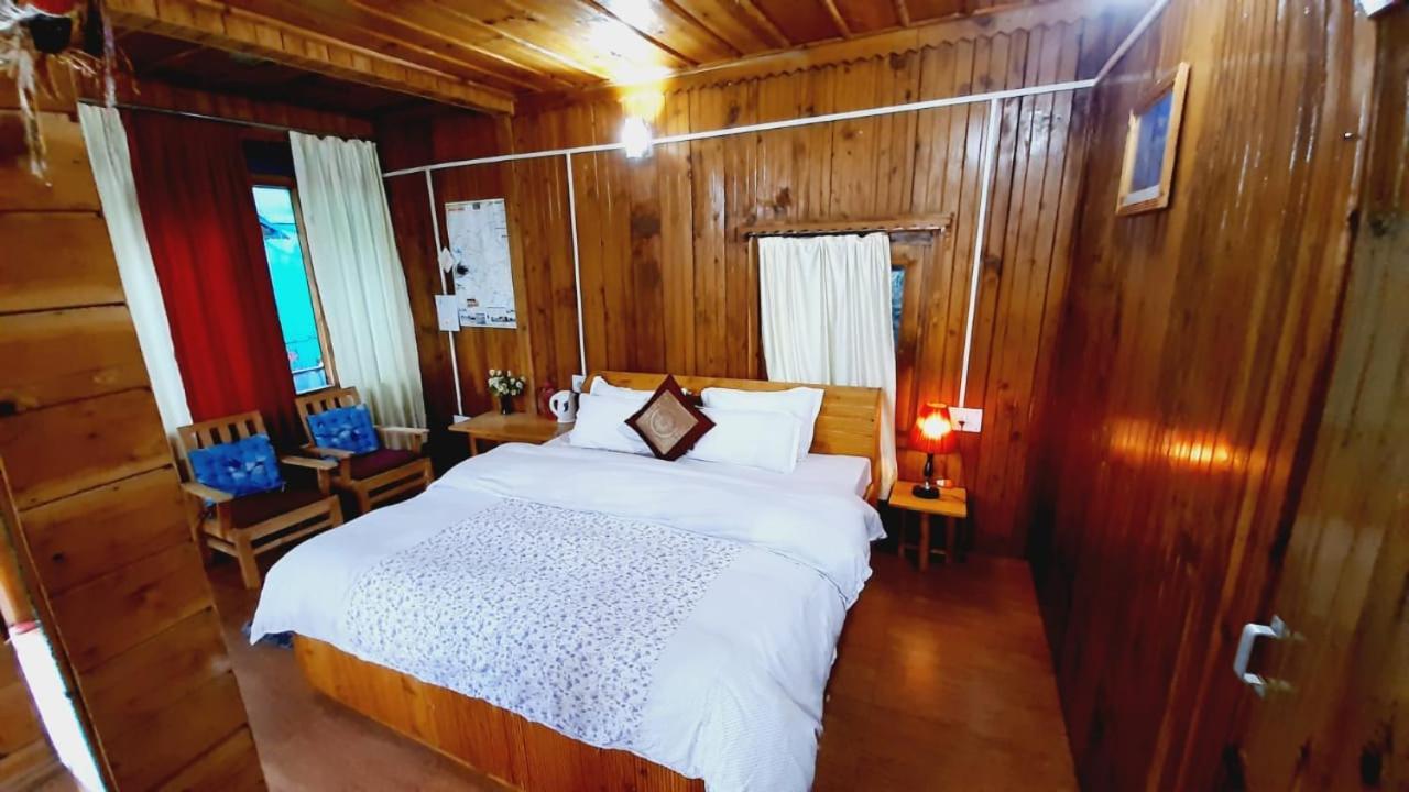 Ishan Log Huts-A Boutique Home Stay Banjār Dış mekan fotoğraf