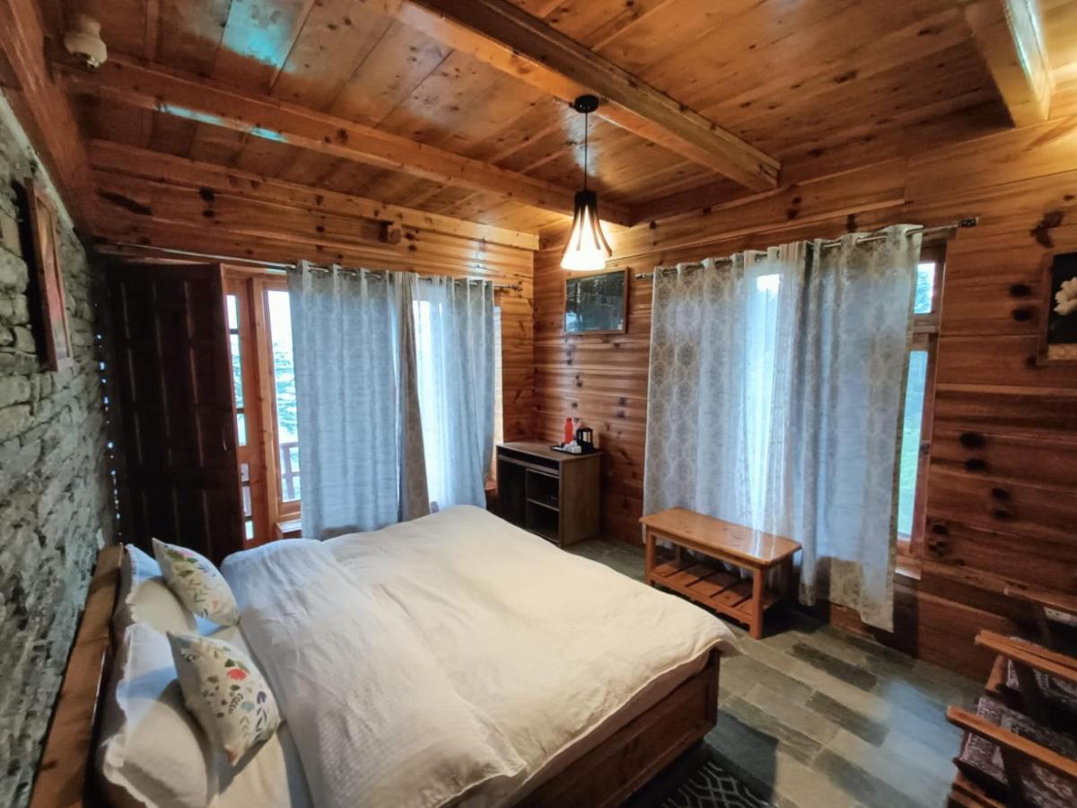 Ishan Log Huts-A Boutique Home Stay Banjār Dış mekan fotoğraf