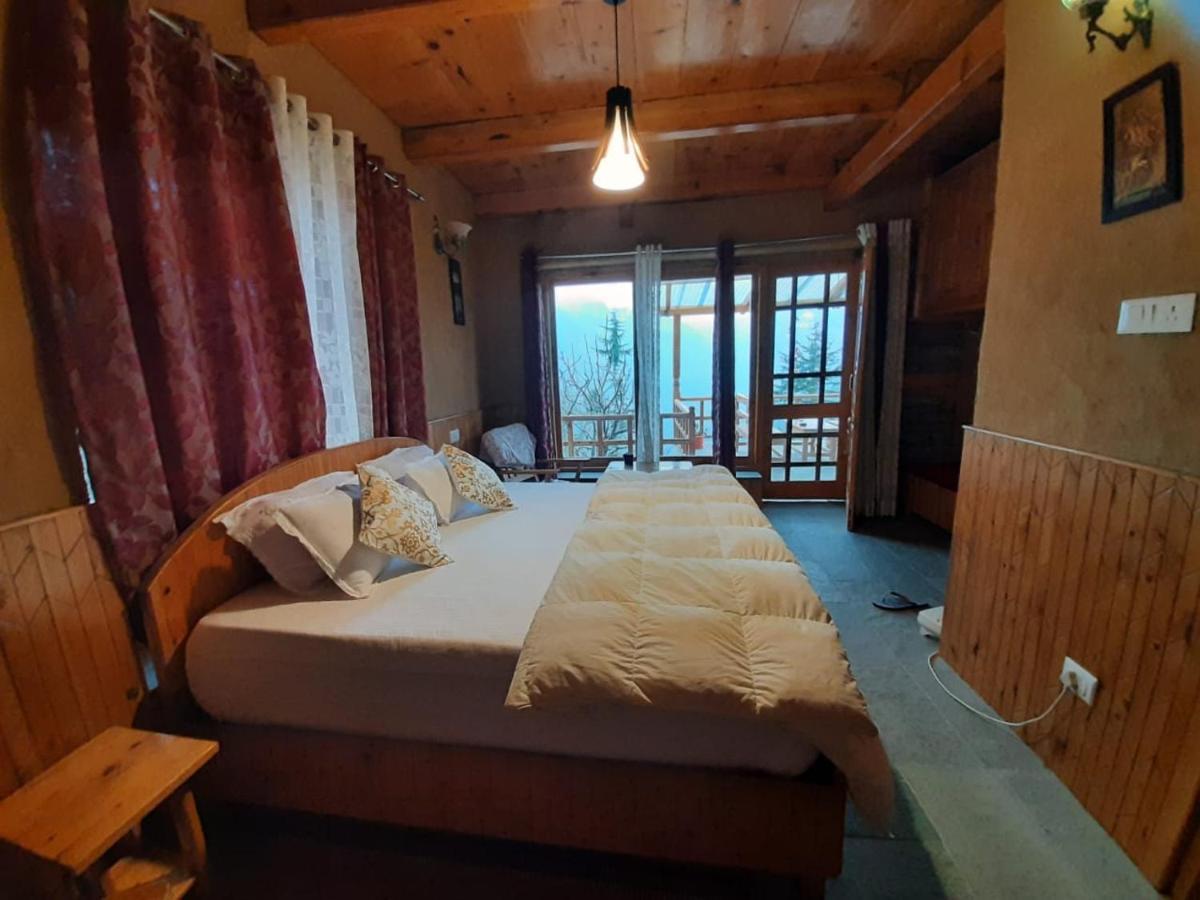 Ishan Log Huts-A Boutique Home Stay Banjār Dış mekan fotoğraf